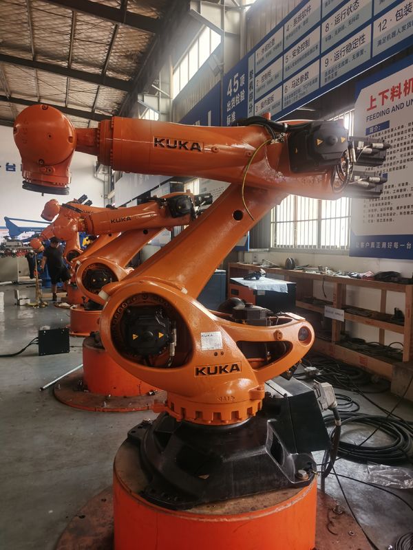 KUKA KR300 R2500 Ultra 300kg Faydalı Yük 2500mm Uzaklık Tekrarlanabilirliği ±0.1 mm'lik Kullanılmış KUKA Robotu Ve Kuka Programlama Yükleme Robotu İşleme Süzme Fırlatma