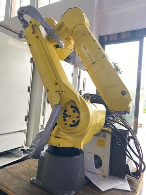 6 ekseni ve kontrolörü olan kaynak malzemesi çıkarma robotları 140 kg ağırlıkta